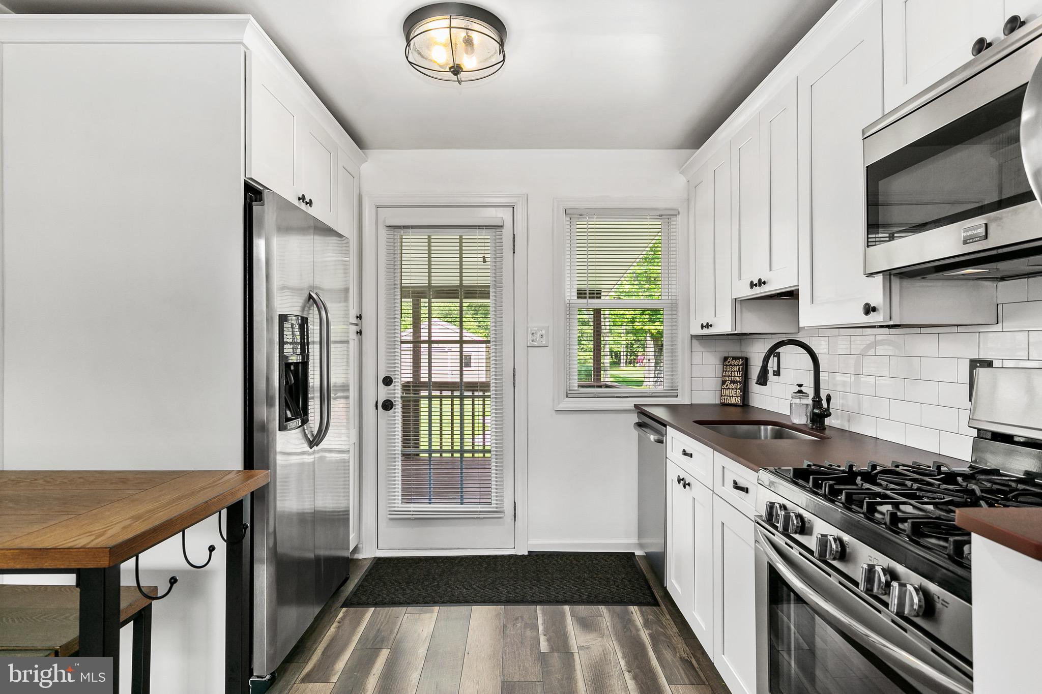 59 Chest-Georgetown Road Columbus, NJ 08022 - Photo 11 of 30 a kitchen with granite countertop a stove and a sink