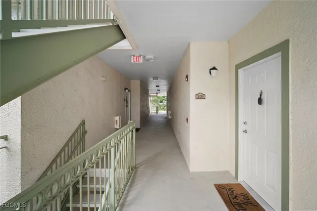 a view of hallway with stairs