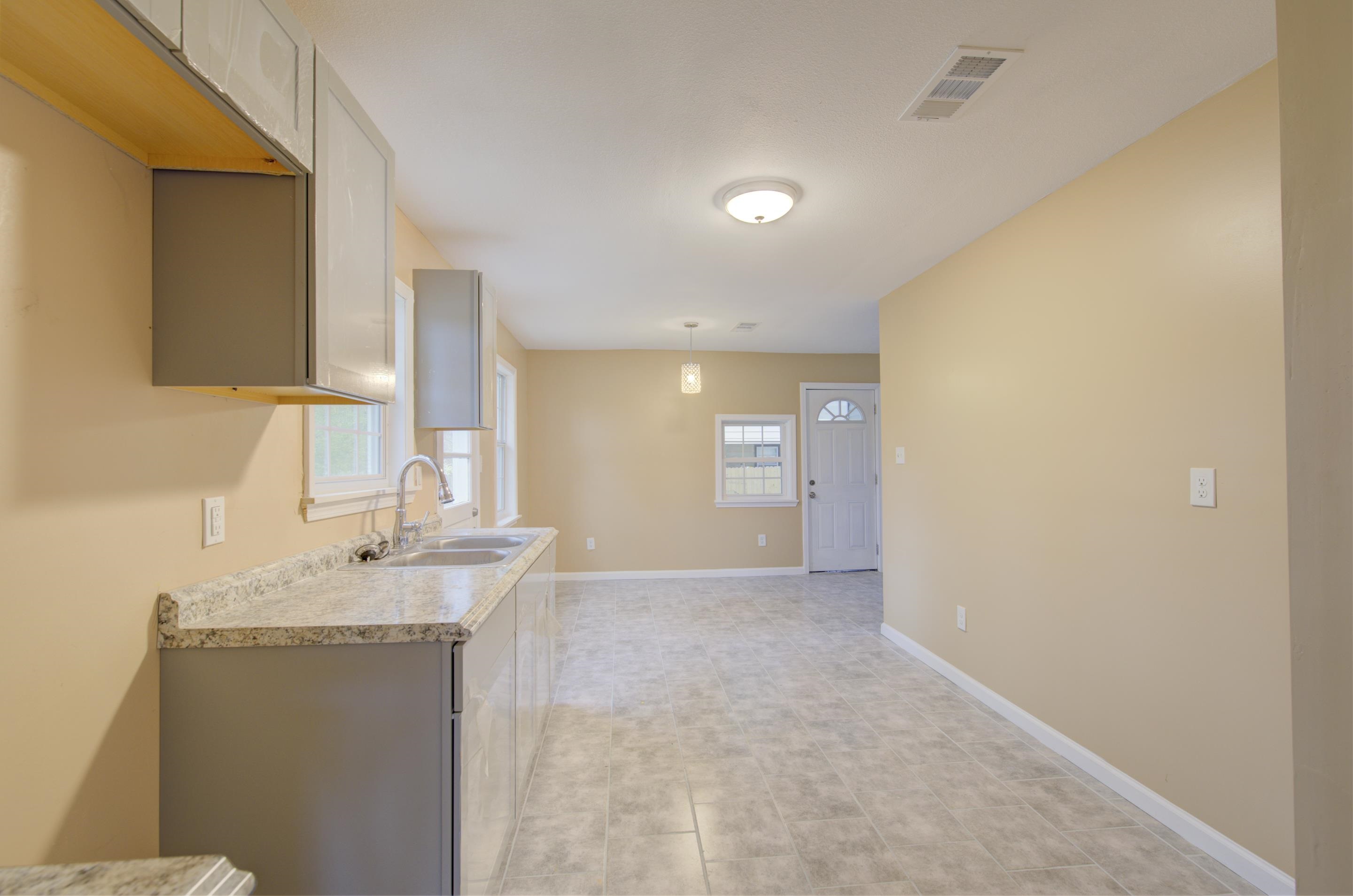 5546 Millbranch Road Memphis, TN 38116 - Photo 11 of 24 a view of a kitchen cabinets and a sink