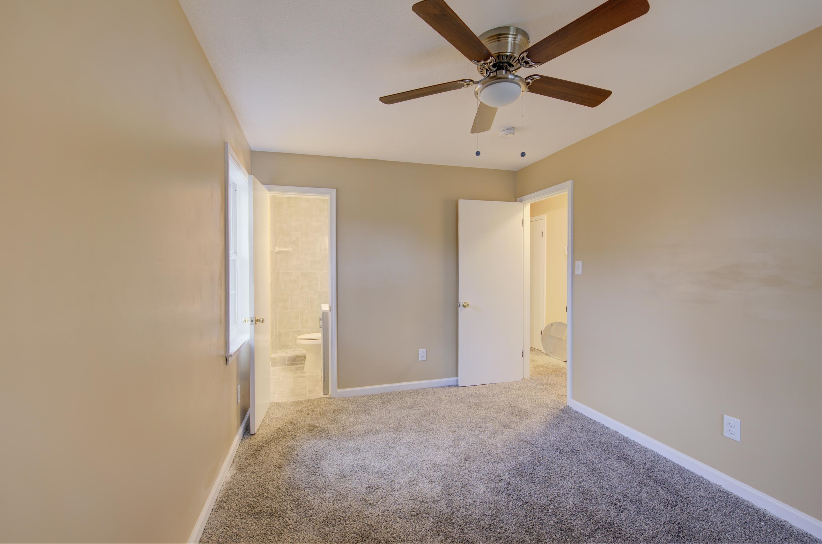 5546 Millbranch Road Memphis, TN 38116 - Photo 13 of 24 an empty room with fan and a ceiling fan