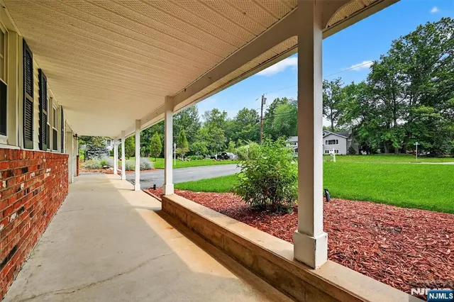 a view of porch with a backyard