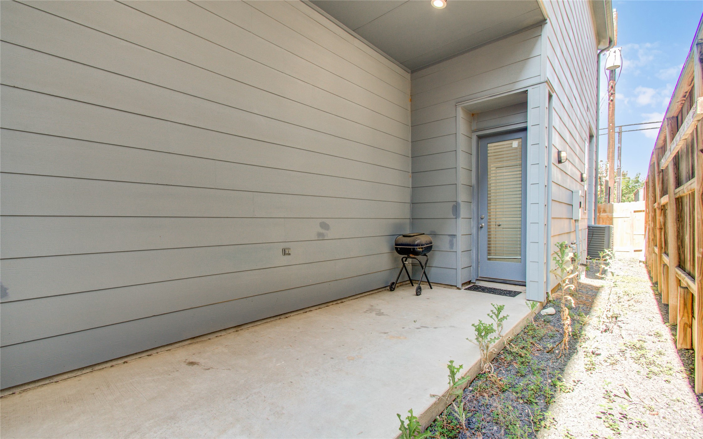 8903 Spring Knoll Forest Drive Houston, TX 77080 - Photo 26 of 29 a room with a bench and dryer