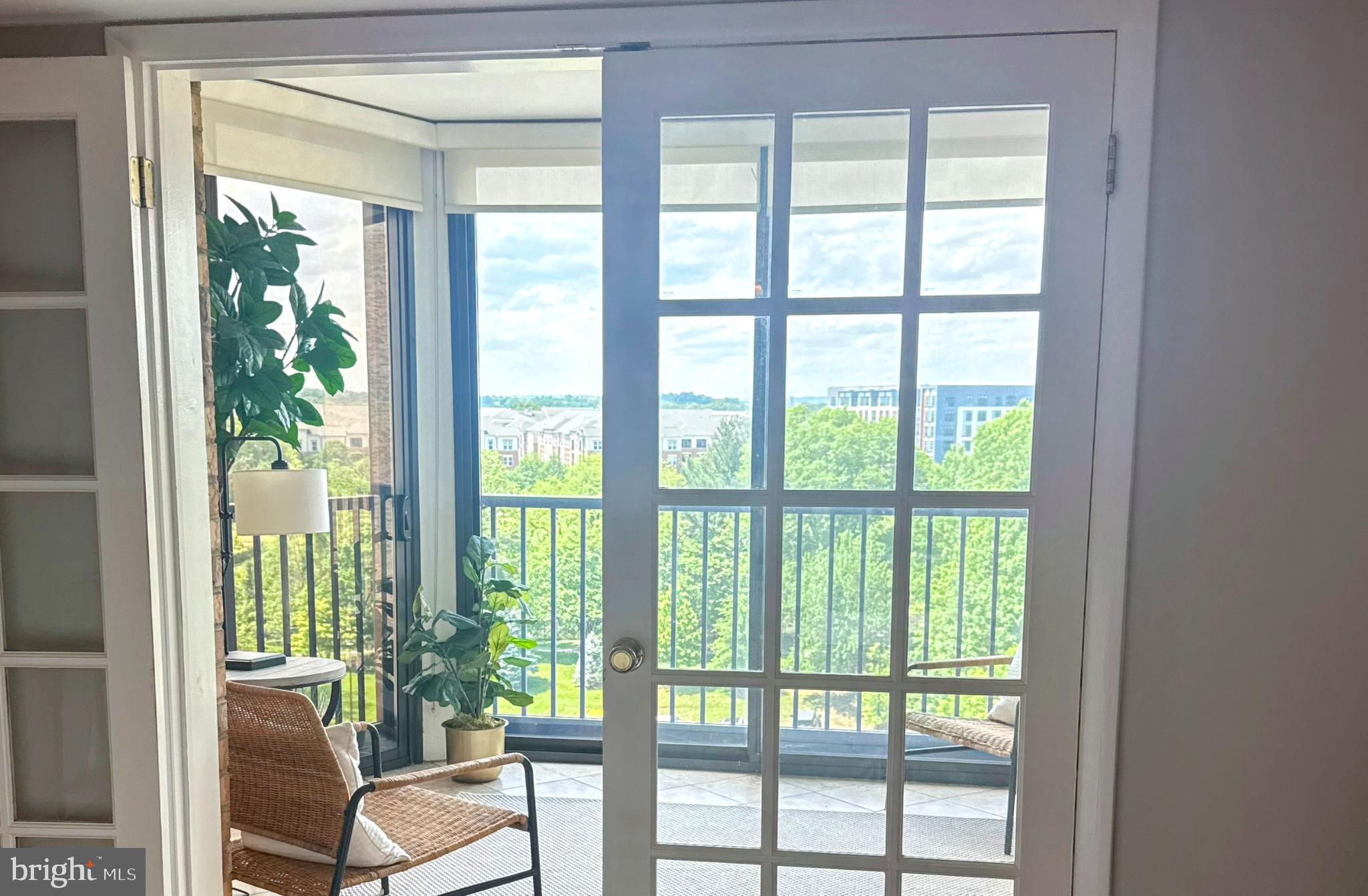 5902 Mt Eagle Drive, Unit 905 Alexandria, VA 22303 - Photo 1 of 55 a view of a room with balcony and wooden floor