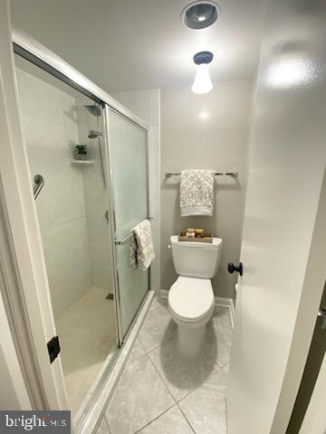 5902 Mt Eagle Drive, Unit 905 Alexandria, VA 22303 - Photo 16 of 55 a bathroom with a toilet and a shower