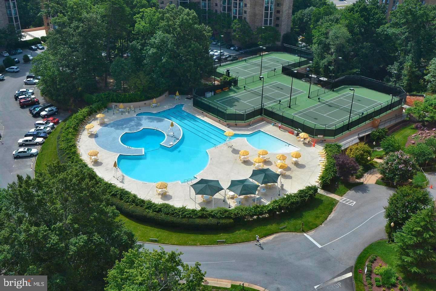 5902 Mt Eagle Drive, Unit 905 Alexandria, VA 22303 - Photo 24 of 55 an aerial view of a swimming pool a yard and outdoor seating