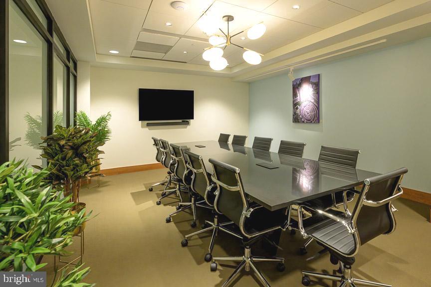 5902 Mt Eagle Drive, Unit 905 Alexandria, VA 22303 - Photo 41 of 55 a view of a dining room with furniture and wooden floor