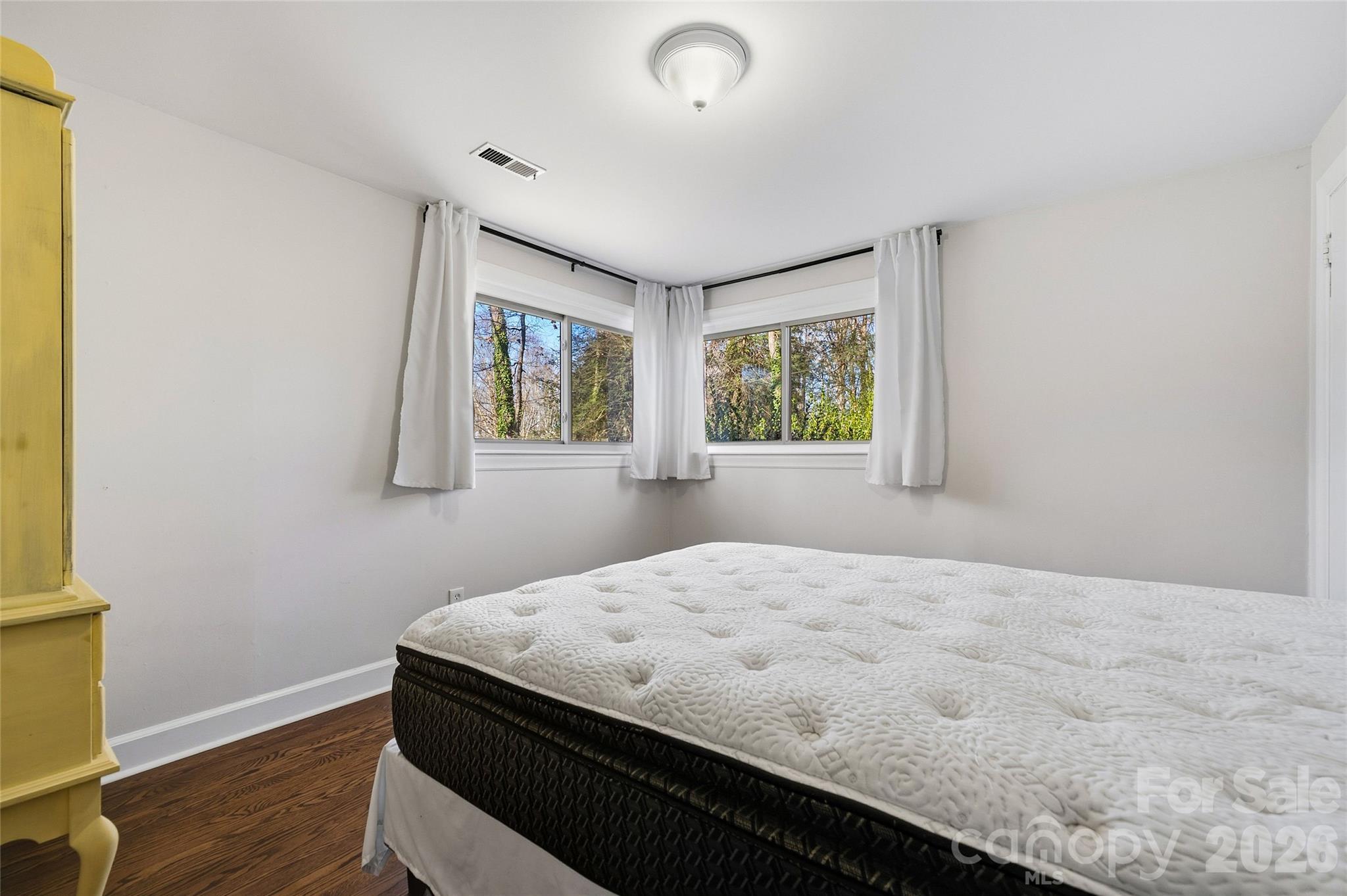 718 2nd Avenue Northeast Conover, NC 28613 - Photo 15 of 29 a bedroom with a bed and a window