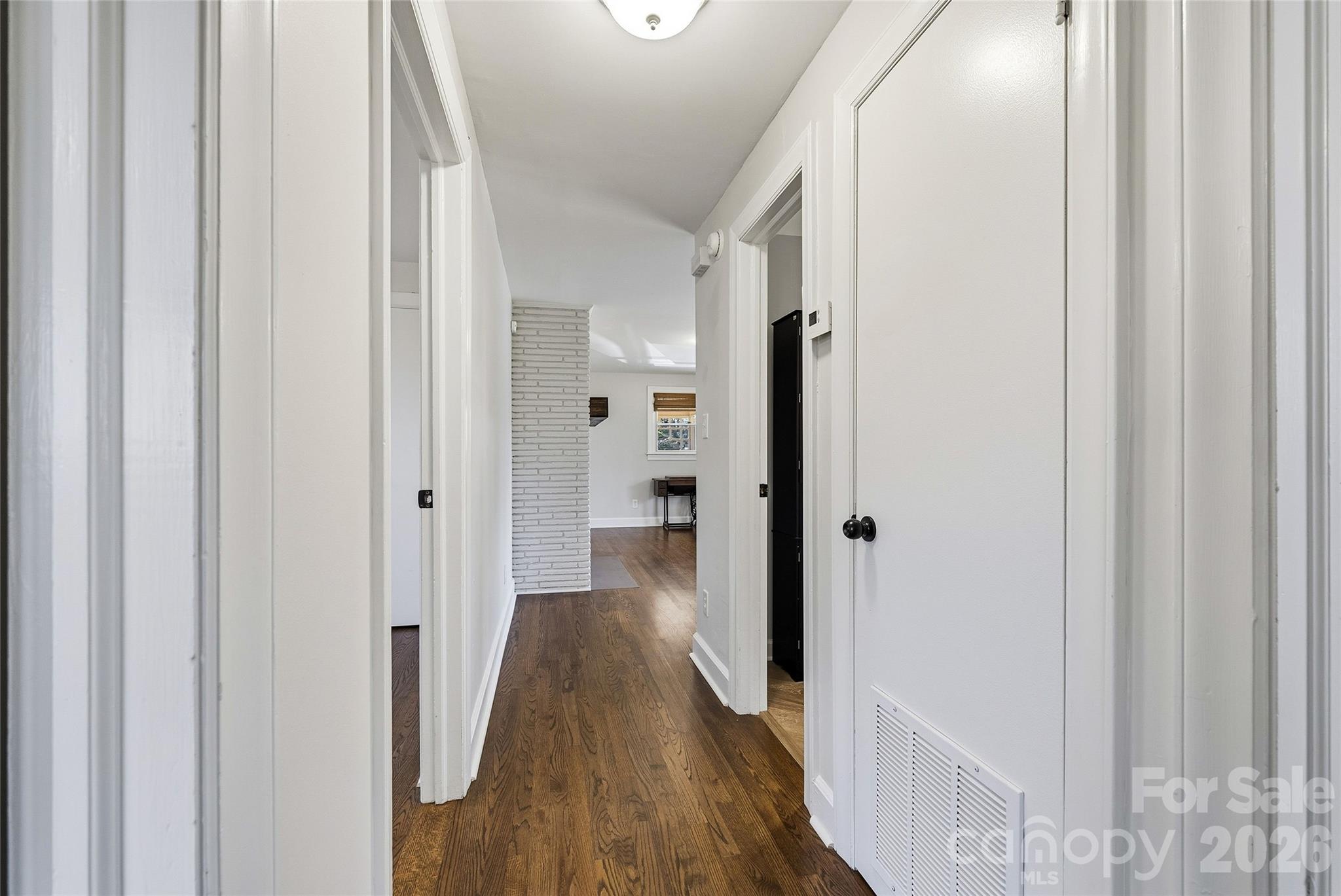 718 2nd Avenue Northeast Conover, NC 28613 - Photo 18 of 29 a view of a hallway with wooden floor