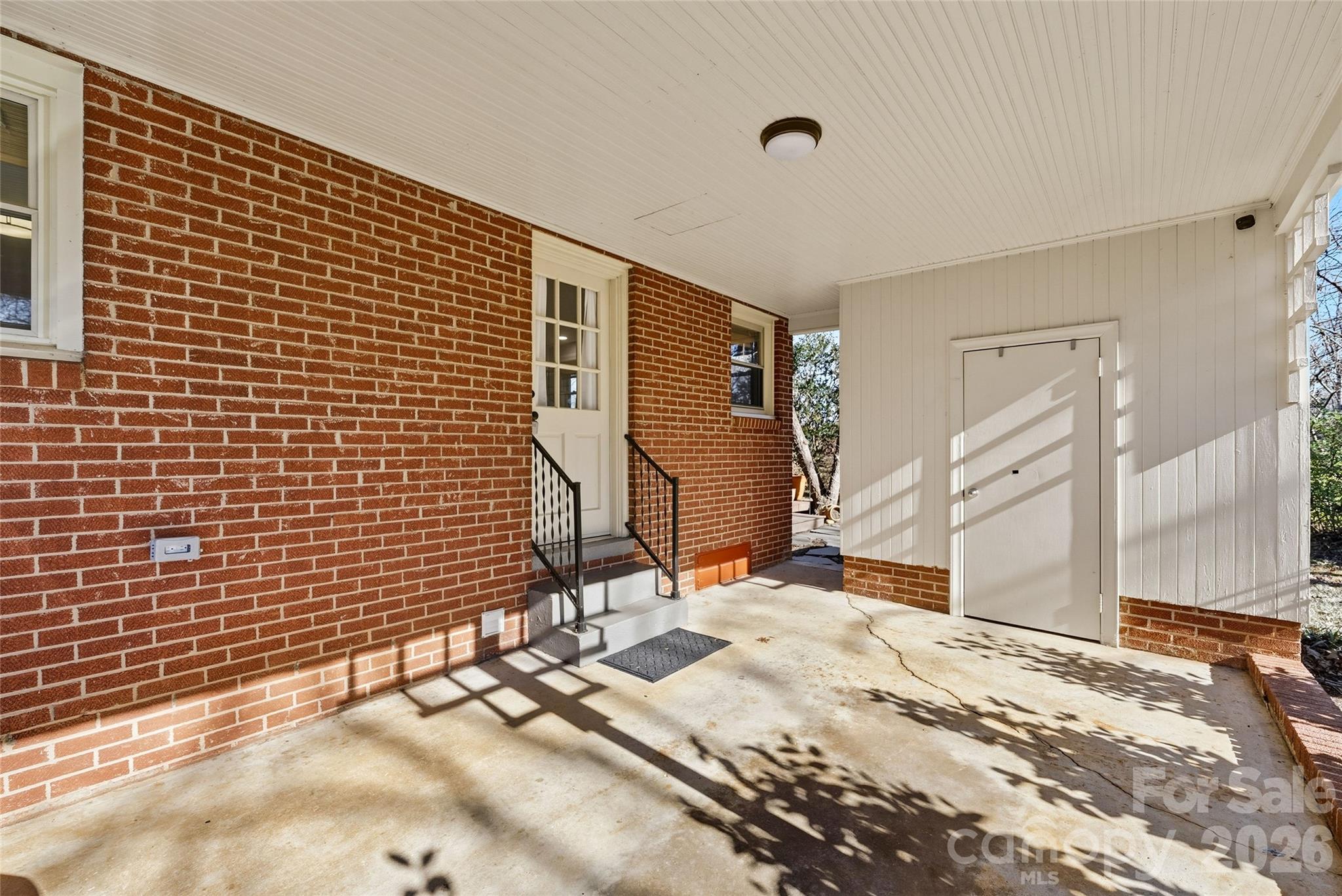 718 2nd Avenue Northeast Conover, NC 28613 - Photo 19 of 29 a view of a terrace with a wooden fence