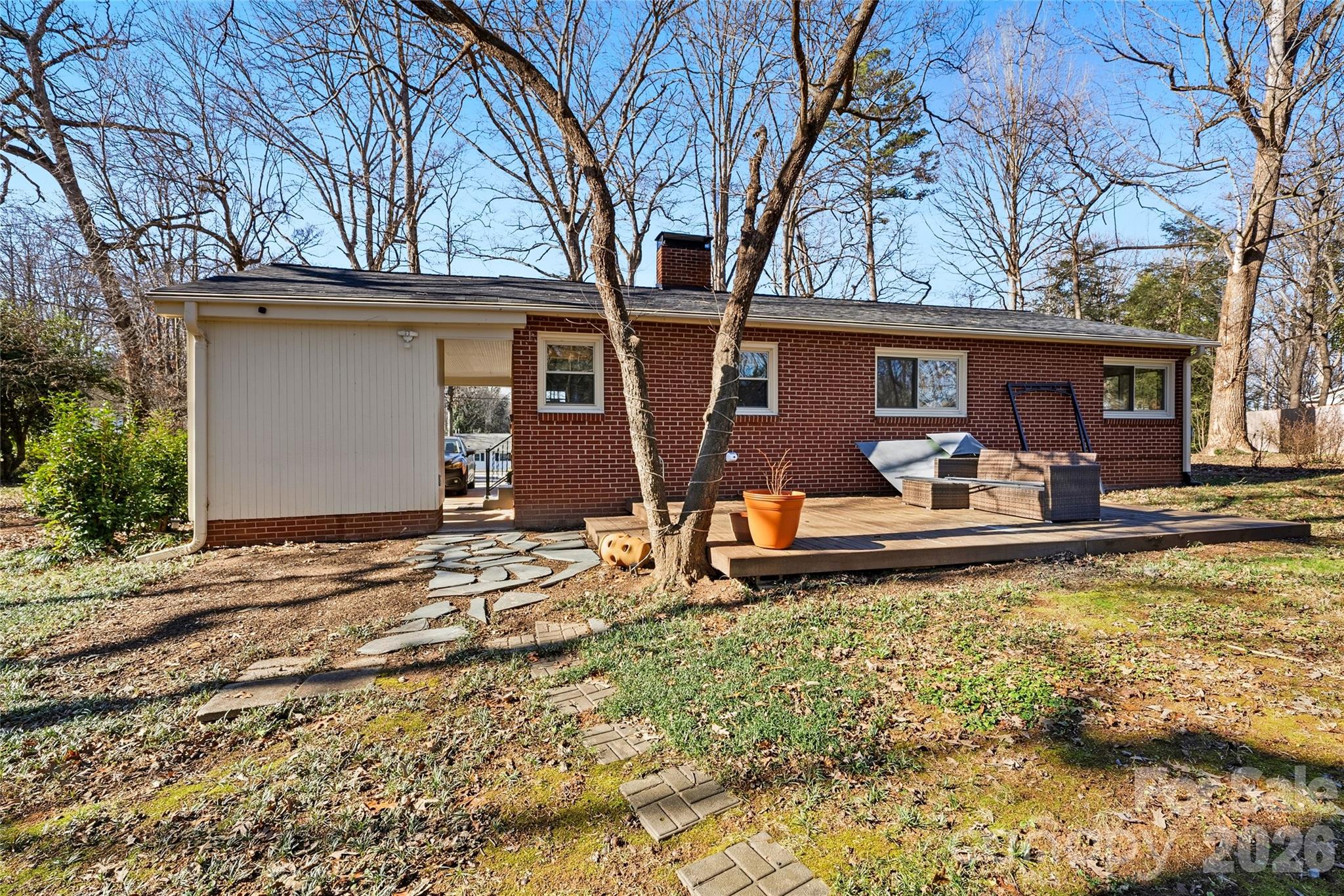 718 2nd Avenue Northeast Conover, NC 28613 - Photo 22 of 29 a front view of house with yard slide and outdoor seating