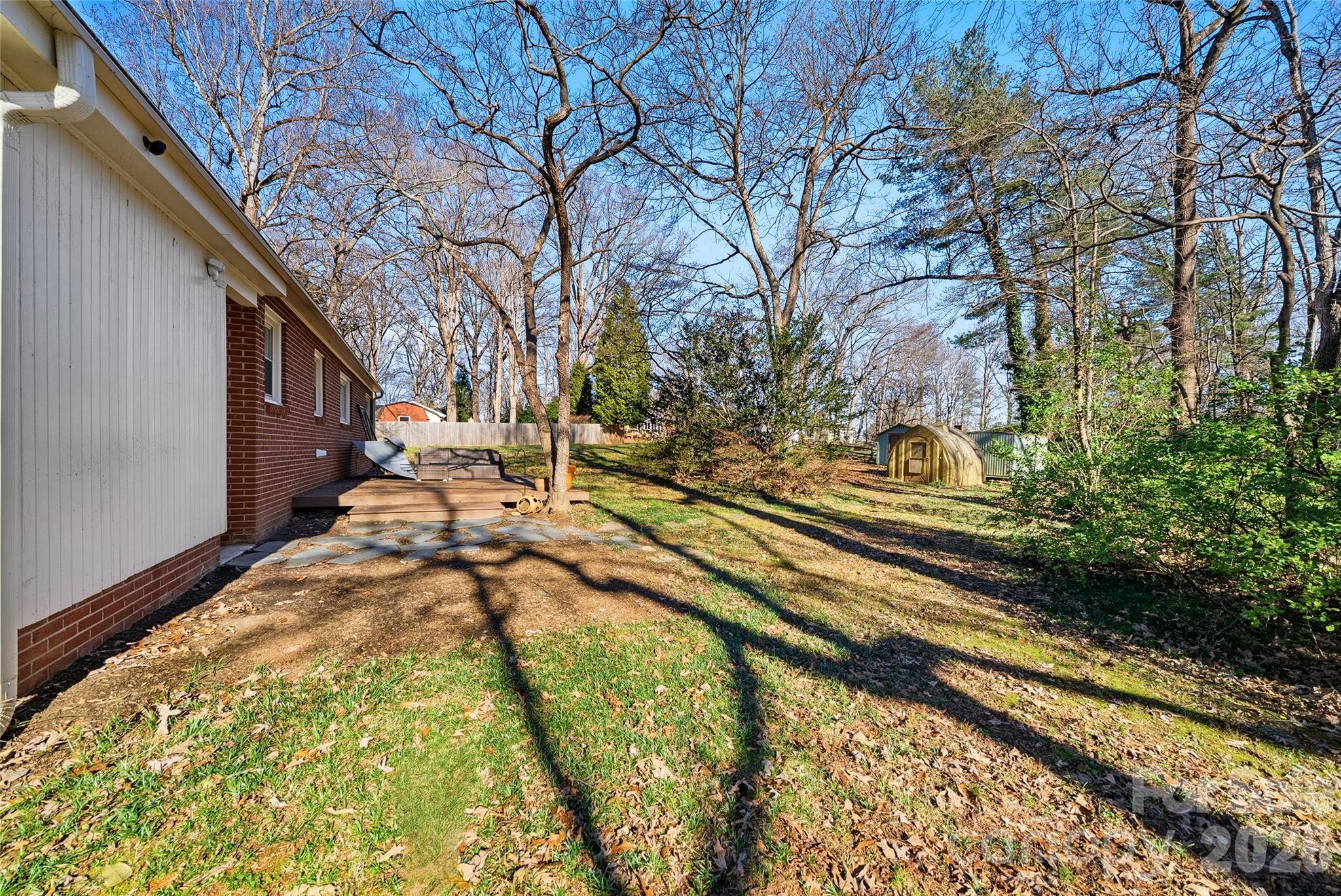 718 2nd Avenue Northeast Conover, NC 28613 - Photo 23 of 29 a view of a yard with plants and trees