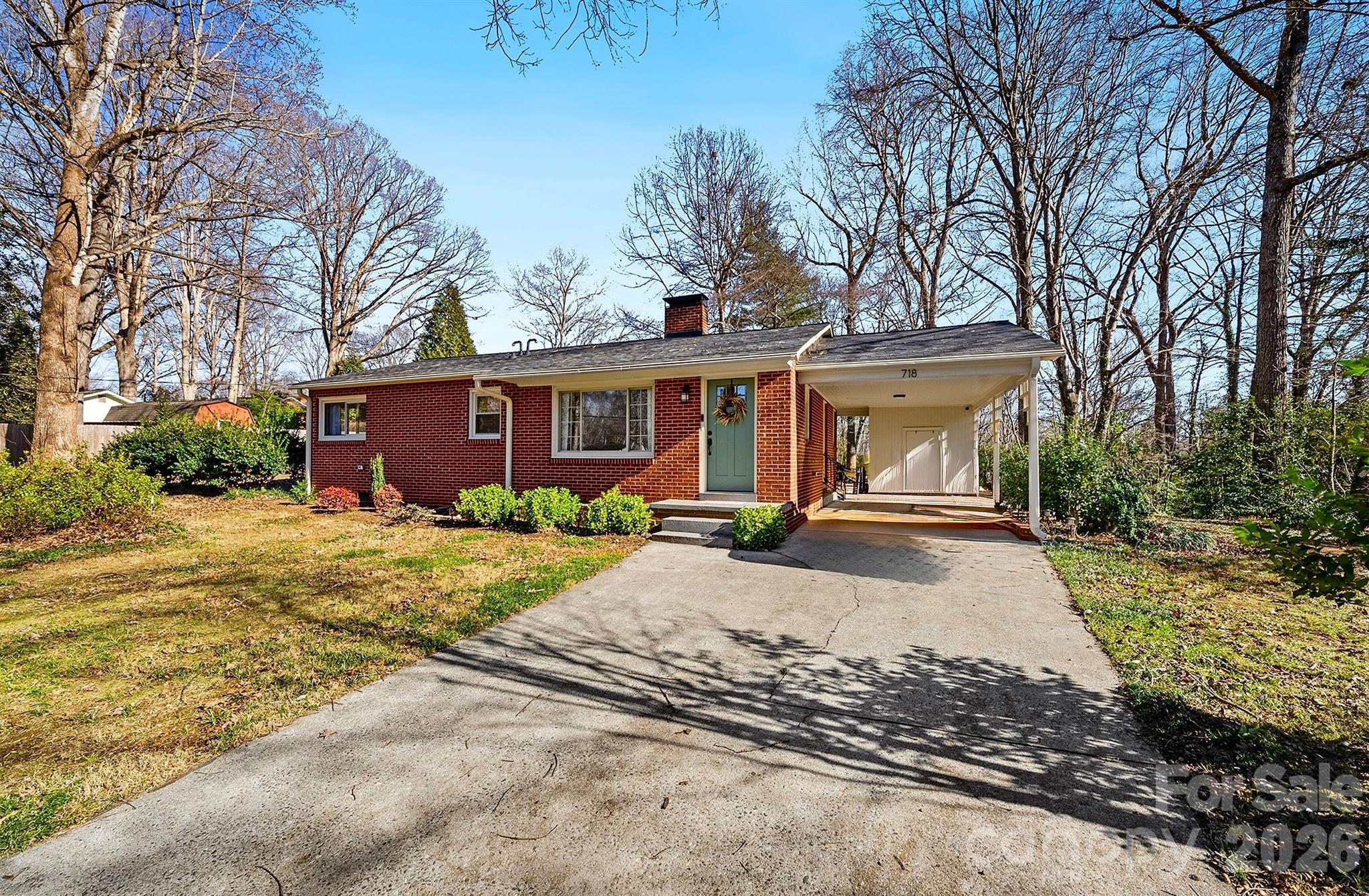 718 2nd Avenue Northeast Conover, NC 28613 - Photo 29 of 29 a front view of a house with a yard and garage