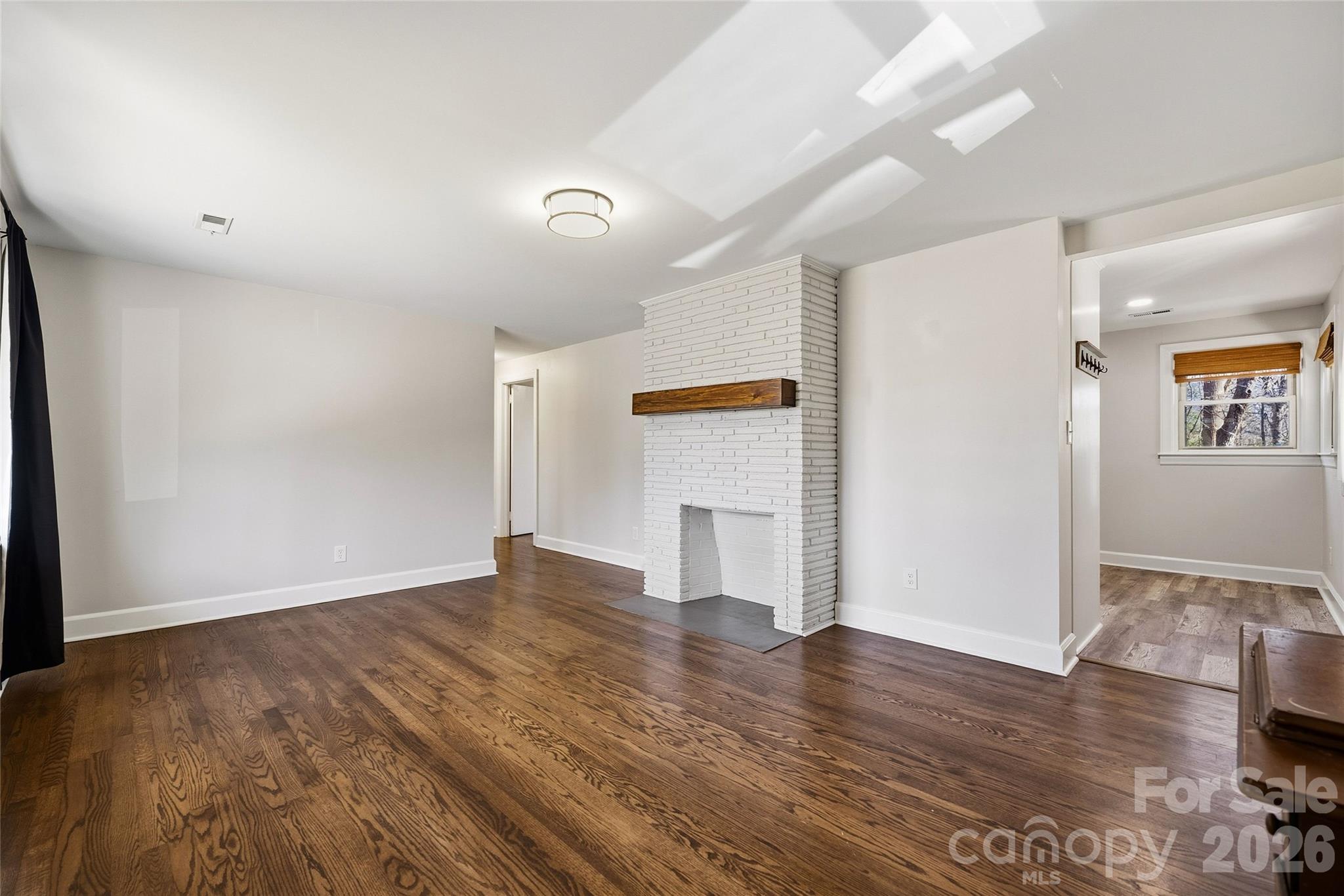 718 2nd Avenue Northeast Conover, NC 28613 - Photo 7 of 29 a view of empty room with wooden floor
