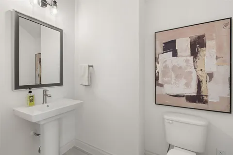 a spacious bedroom with a bed and a couch