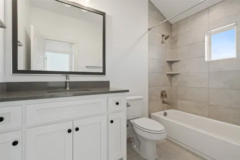 a big room with closet and windows