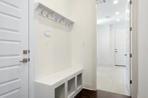 a view of a house with porch and windows