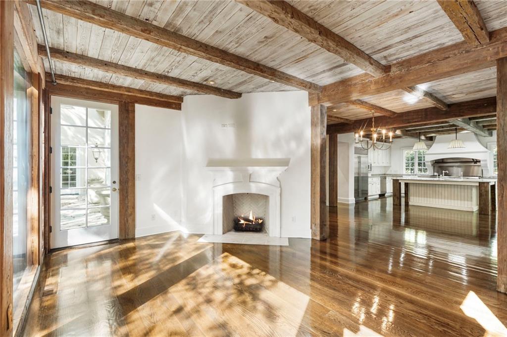 2485 West Wesley Road Northwest Atlanta, GA 30327 - Photo 25 of 84 a view of a livingroom with wooden floor