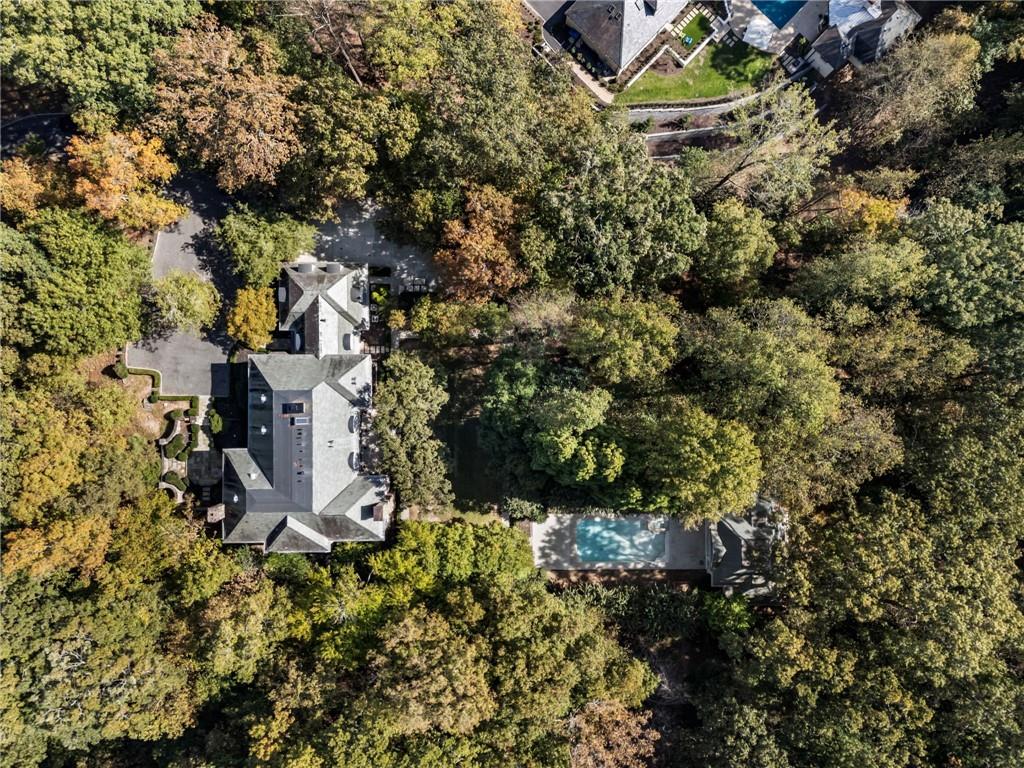 2485 West Wesley Road Northwest Atlanta, GA 30327 - Photo 3 of 84 an aerial view of residential house with outdoor space and trees all around