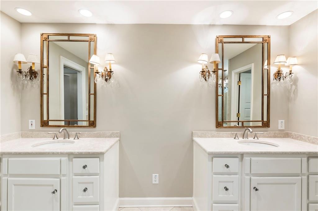 2485 West Wesley Road Northwest Atlanta, GA 30327 - Photo 37 of 84 a bathroom with a double vanity sink mirror and
