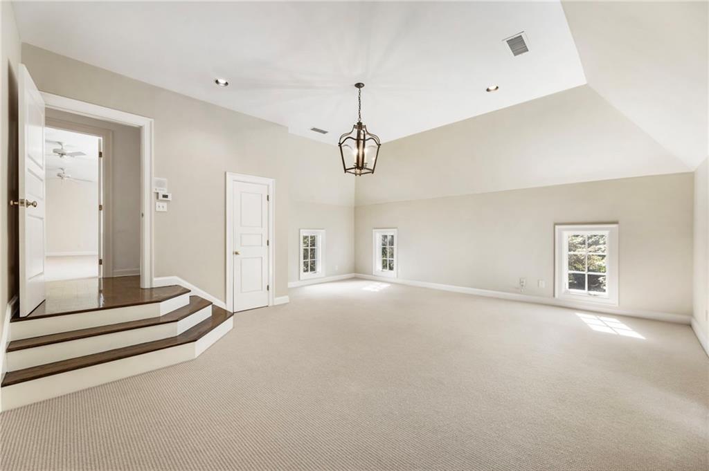 2485 West Wesley Road Northwest Atlanta, GA 30327 - Photo 57 of 84 a view of an empty room with a window