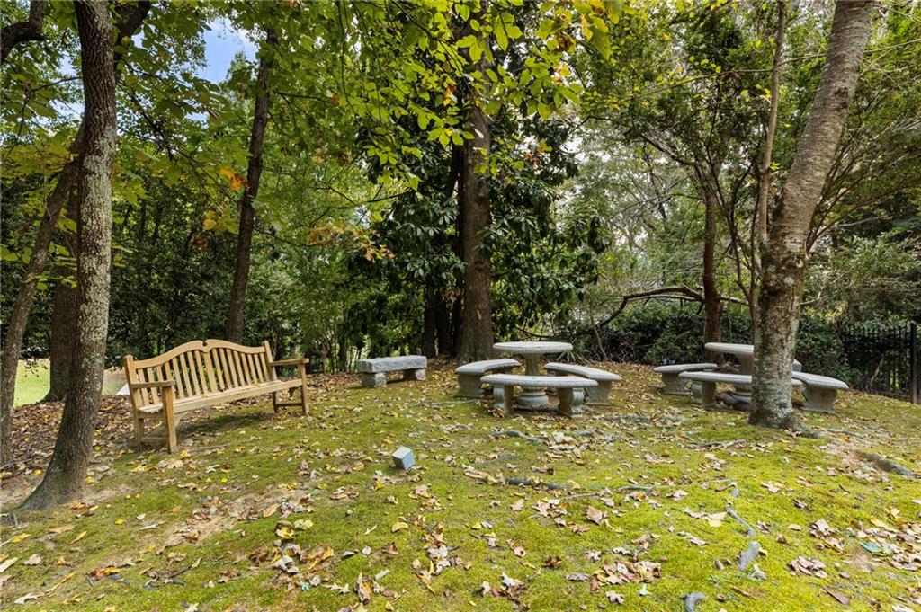 2485 West Wesley Road Northwest Atlanta, GA 30327 - Photo 83 of 84 a view of a table and chairs in the patio