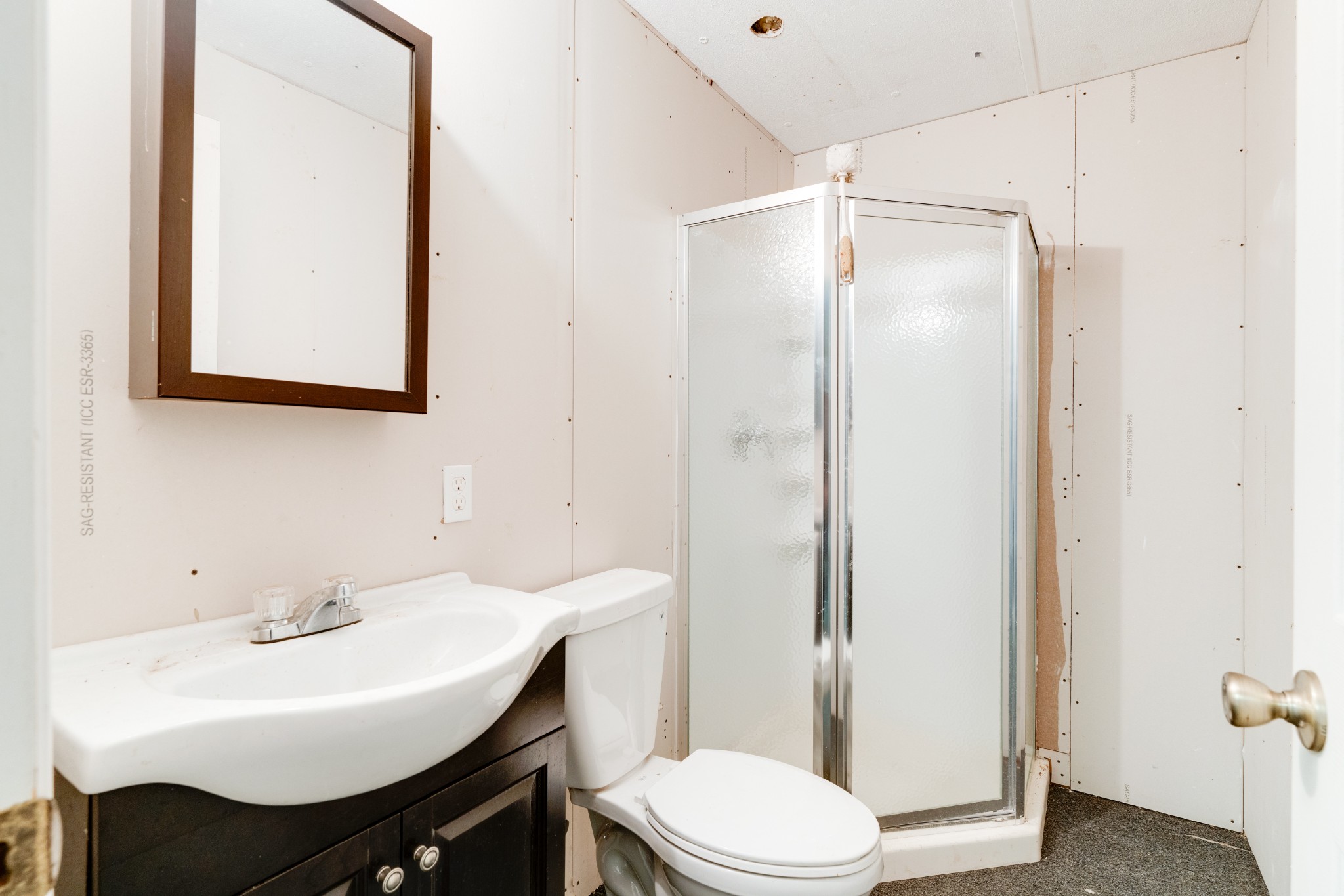 401 Pelham Pointe Road Pelham, TN 37366 - Photo 54 of 97 a bathroom with a sink toilet and shower