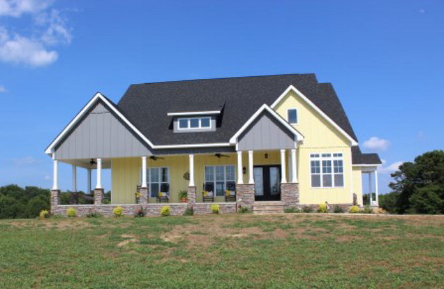 700 King Road Forsyth, GA 31029 - Photo 1 of 22 a front view of a house with a yard and trees