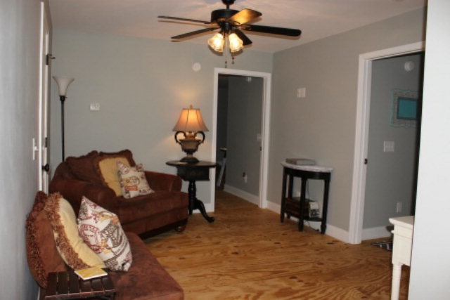 700 King Road Forsyth, GA 31029 - Photo 12 of 22 a living room with furniture and a window
