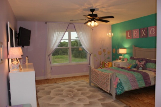 700 King Road Forsyth, GA 31029 - Photo 18 of 22 a bedroom with a bed and a flat screen tv