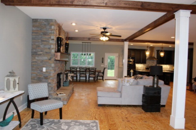 700 King Road Forsyth, GA 31029 - Photo 3 of 22 a living room with furniture and a wooden floor