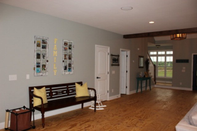 700 King Road Forsyth, GA 31029 - Photo 5 of 22 a living room with furniture and a wooden floor