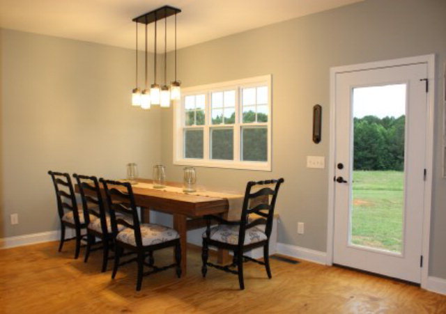 700 King Road Forsyth, GA 31029 - Photo 6 of 22 a view of a dining room with furniture and window