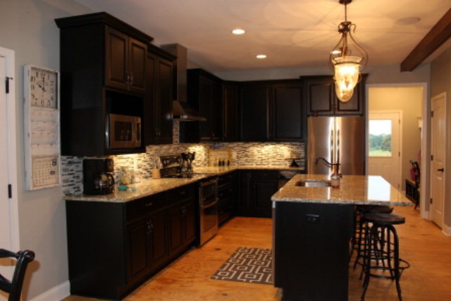 700 King Road Forsyth, GA 31029 - Photo 7 of 22 a kitchen with granite countertop a sink stainless steel appliances and cabinets