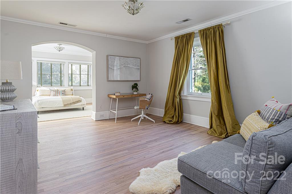 343 Vanderbilt Road Asheville, NC 28803 - Photo 28 of 48 a living room with furniture and a large window