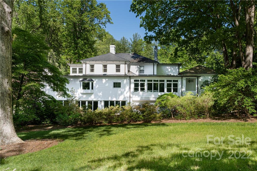 343 Vanderbilt Road Asheville, NC 28803 - Photo 47 of 48 a front view of a house with a yard