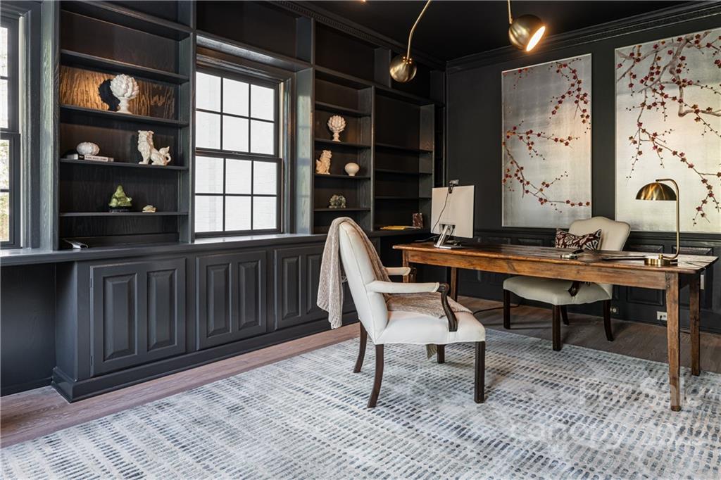 343 Vanderbilt Road Asheville, NC 28803 - Photo 7 of 48 a workspace with wooden floor