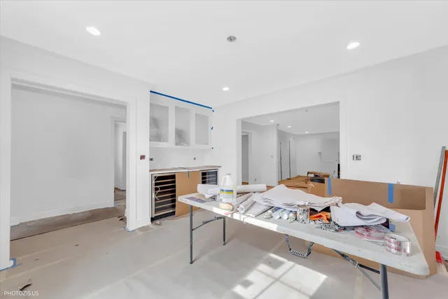 a bed room with furniture and a table