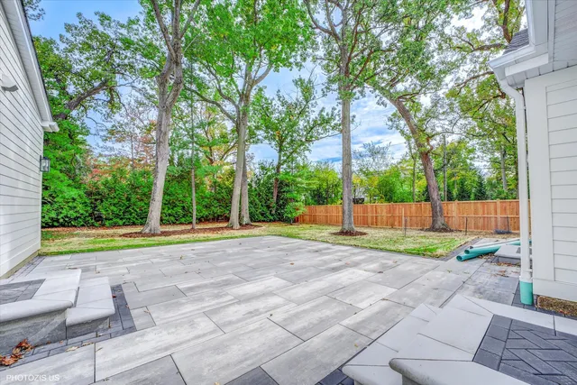 a view of backyard with green space