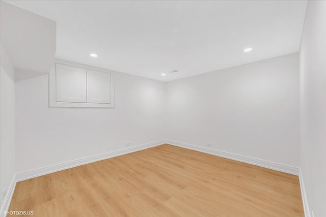 a view of city with lush green forest