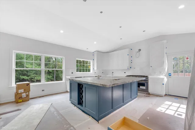 a kitchen with a stove and a sink