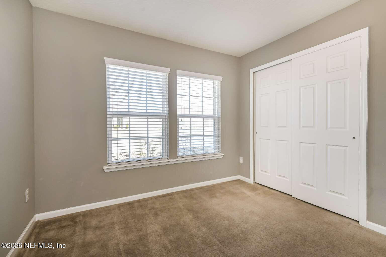 97572 Albatross Drive Yulee, FL 32097 - Photo 15 of 20 a view of an empty room with a window
