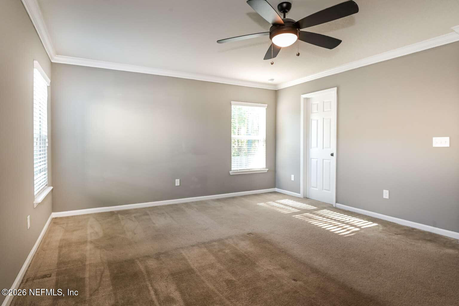 97572 Albatross Drive Yulee, FL 32097 - Photo 17 of 20 a view of an empty room with a window
