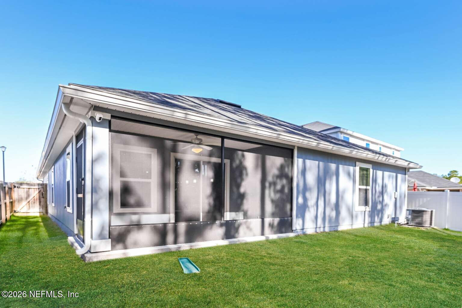 97572 Albatross Drive Yulee, FL 32097 - Photo 18 of 20 a view of backyard with large trees