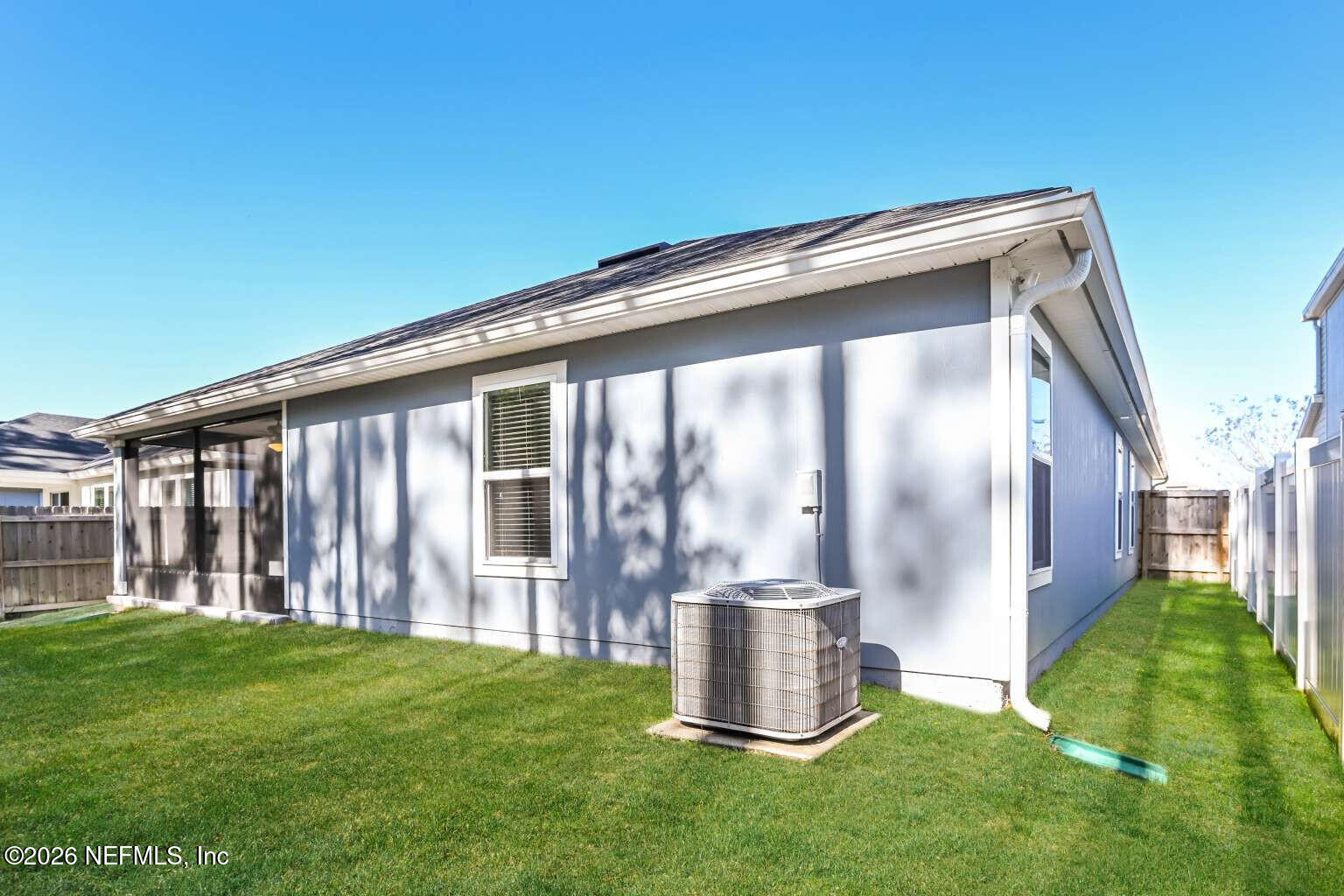 97572 Albatross Drive Yulee, FL 32097 - Photo 19 of 20 a front view of house with yard