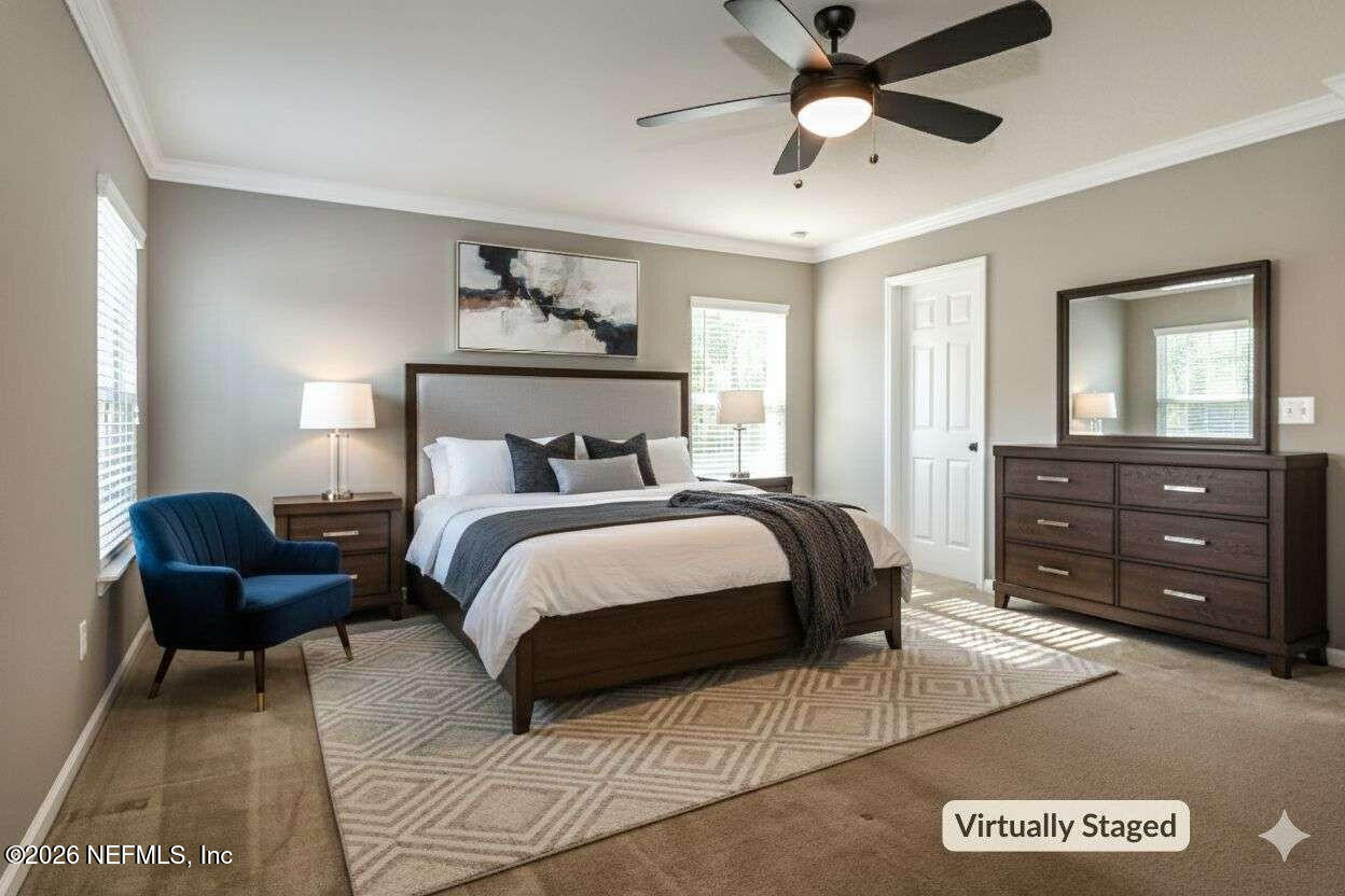 97572 Albatross Drive Yulee, FL 32097 - Photo 6 of 20 a bedroom with a bed and wooden floor