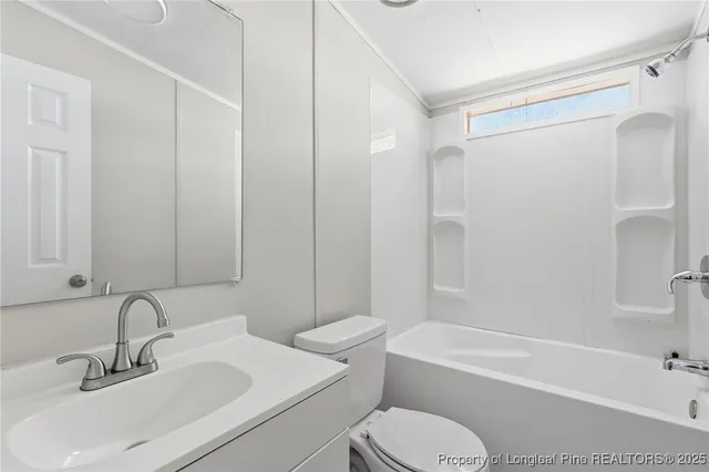 a view of a livingroom with a flat screen tv