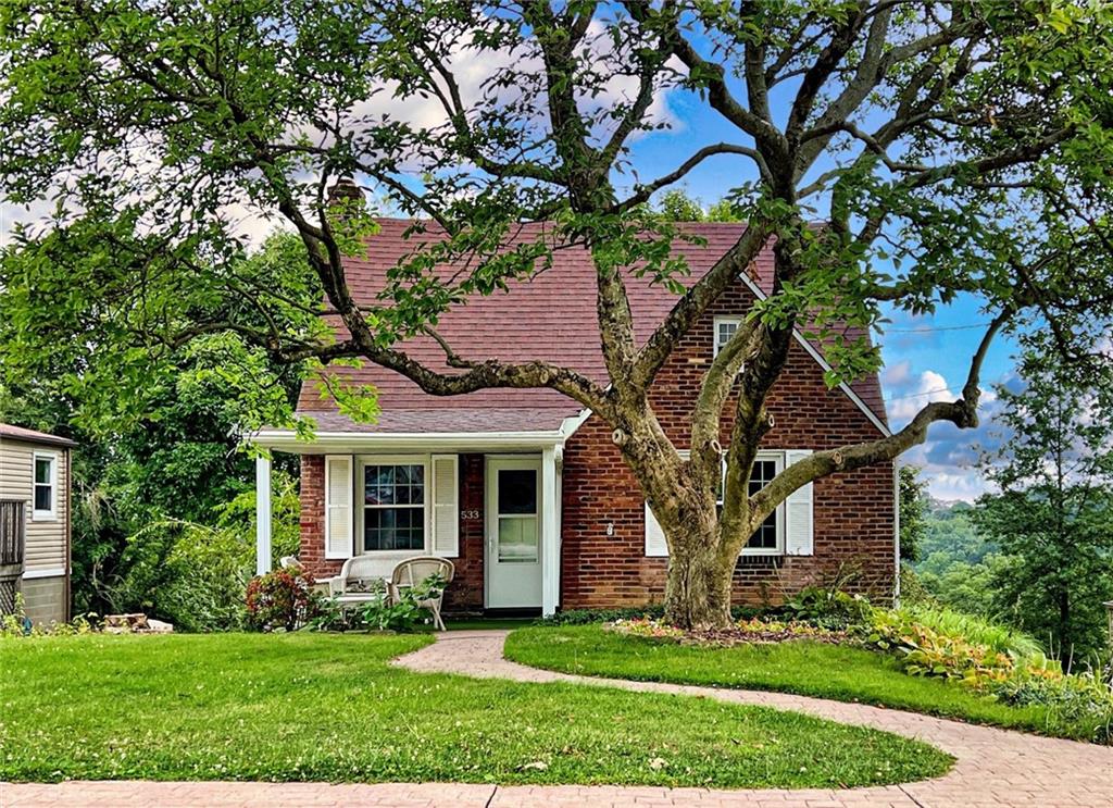 533 Highview Road Pittsburgh, PA 15234 - Photo 1 of 22 a front view of a house with a yard and large tree