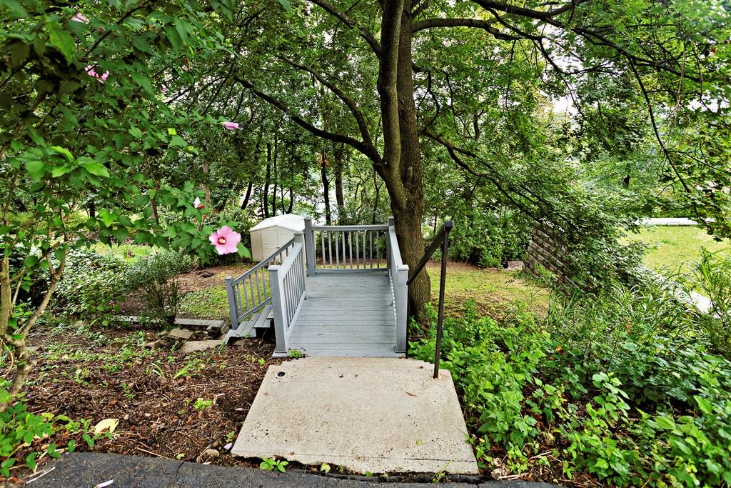 533 Highview Road Pittsburgh, PA 15234 - Photo 17 of 22 a backyard of a house with table and chairs