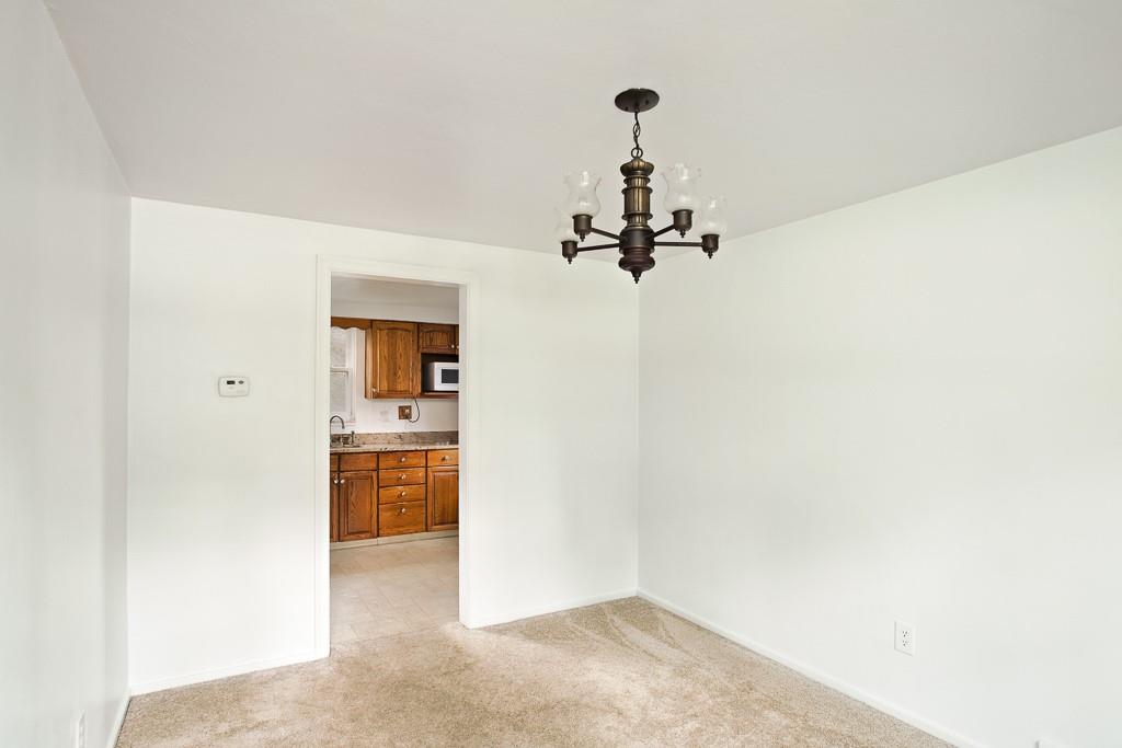 533 Highview Road Pittsburgh, PA 15234 - Photo 4 of 22 a view of a livingroom and a fireplace