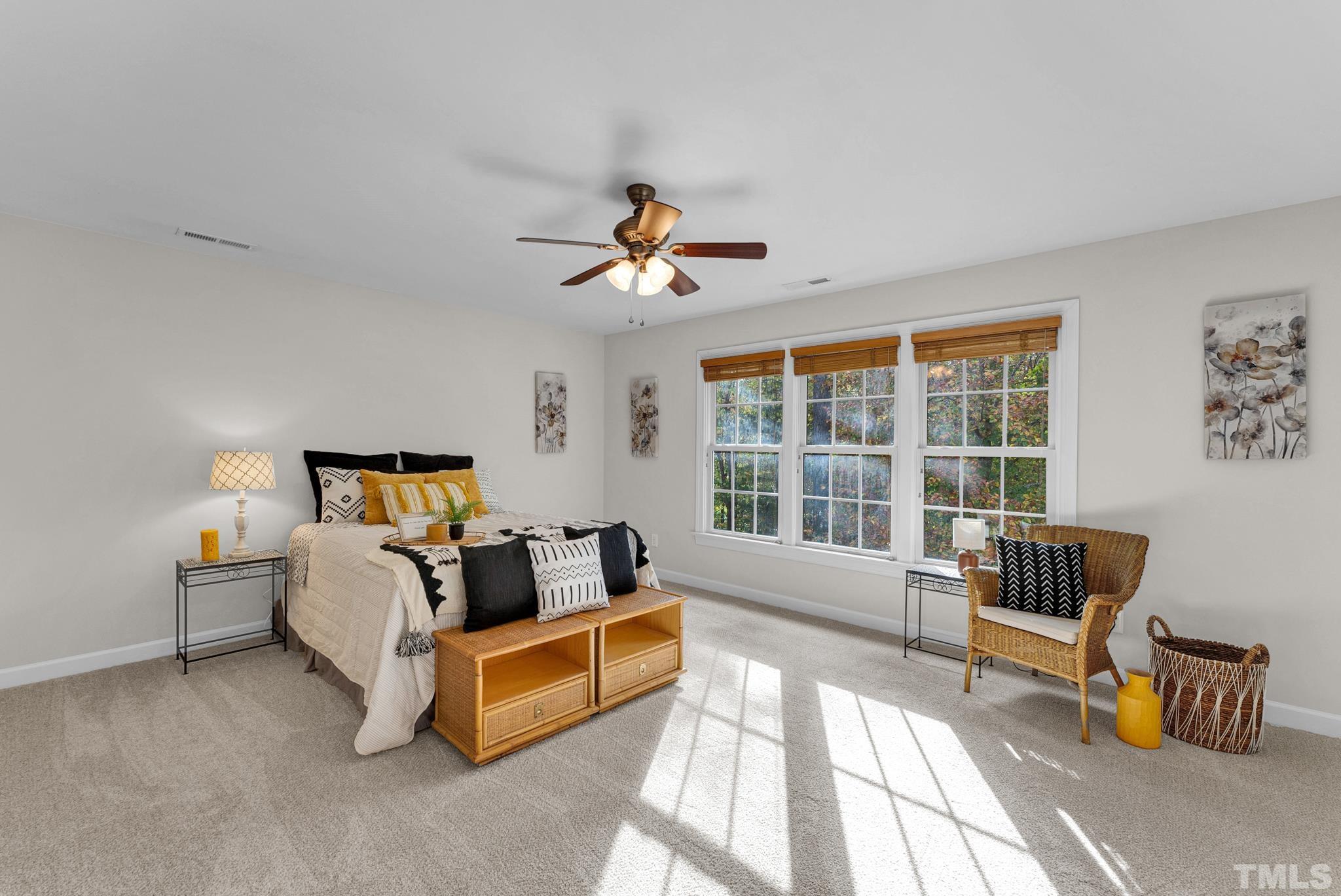 8409 Aptos Court Raleigh, NC 27613 - Photo 27 of 46 a living room with furniture and a large window